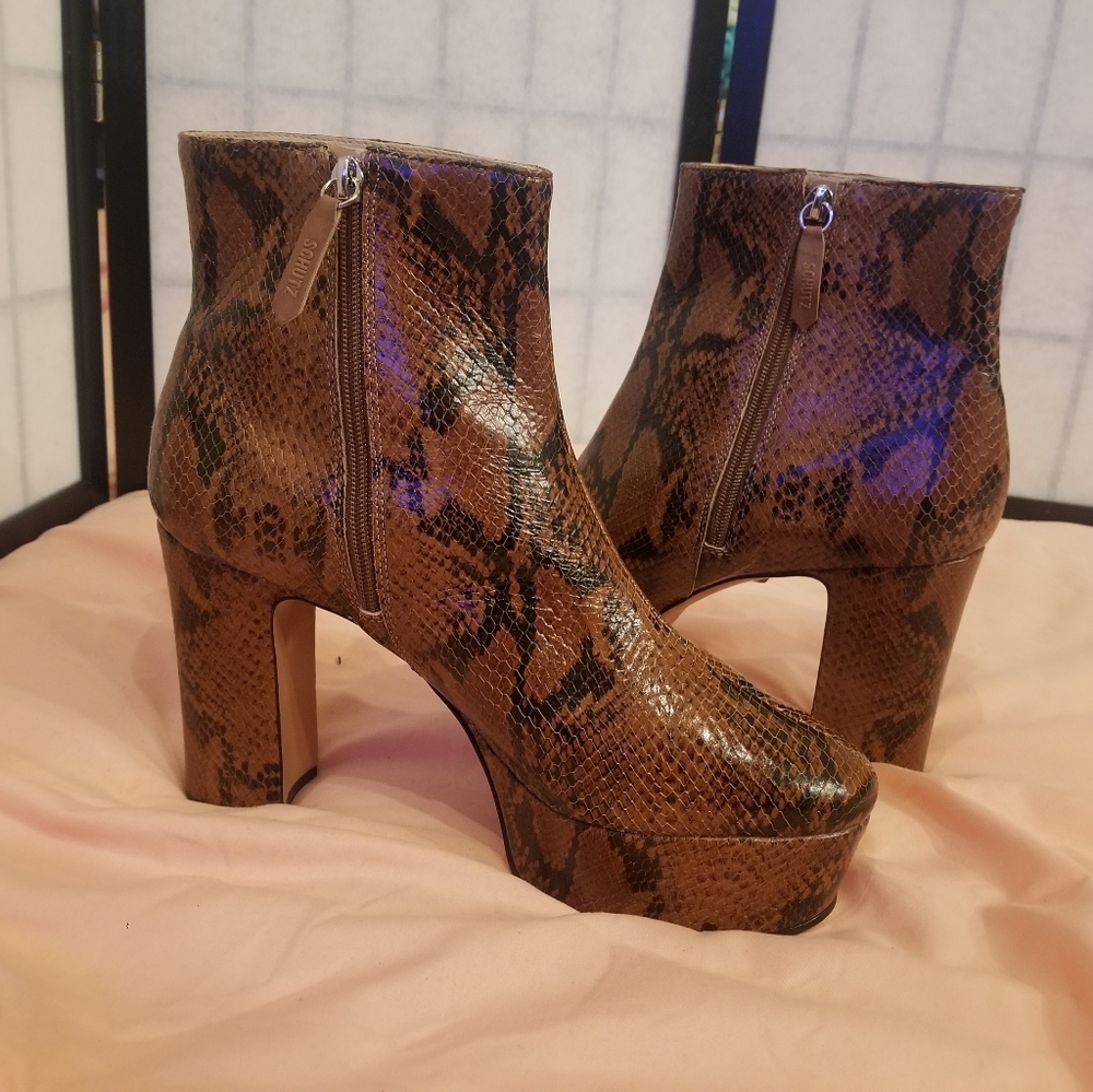 Schutz Snakeskin leather platform boots.